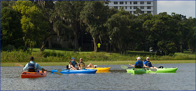 Polk County Extension Agent, Shannon McGee, teaching kayakers about an urban watershed in Winter Park.